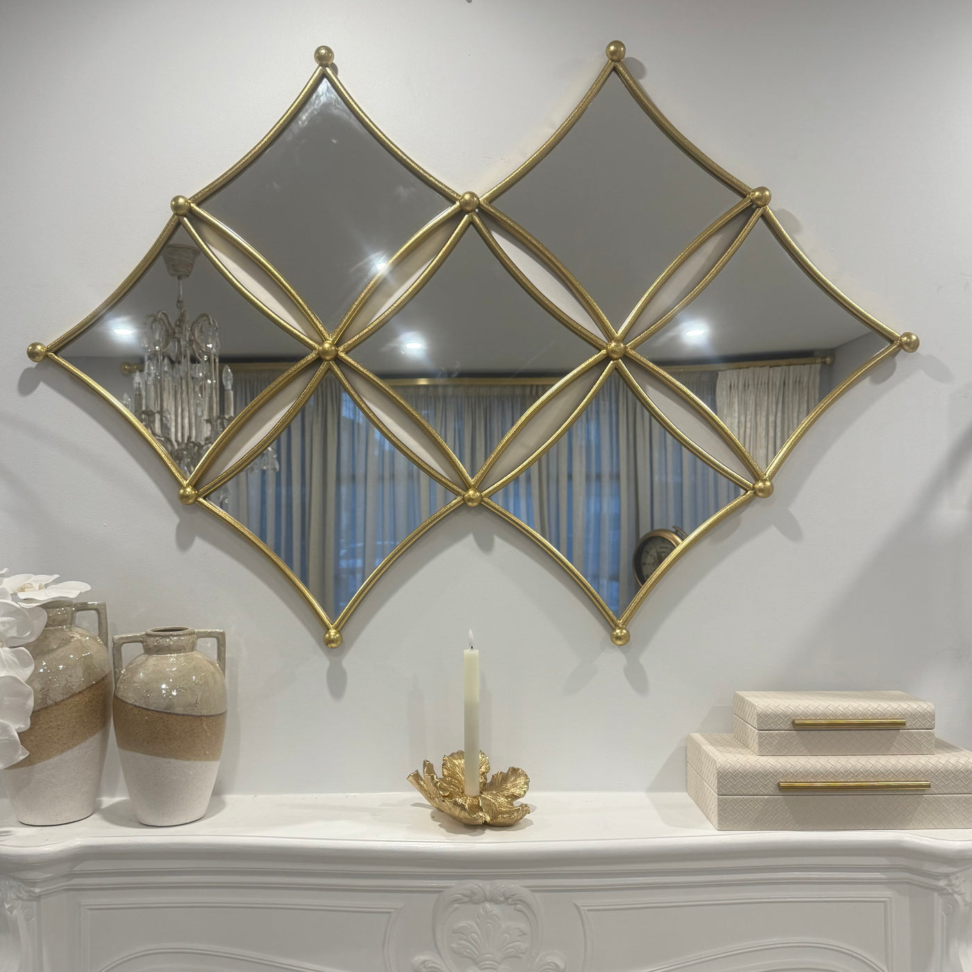 Diamond shaped wall mirror