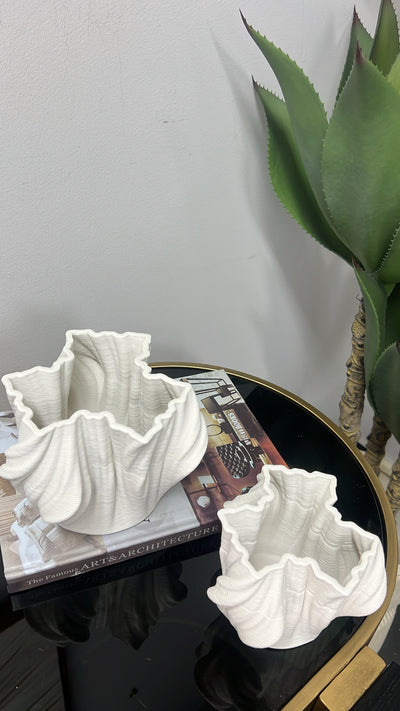 Swivel white ceramic vase