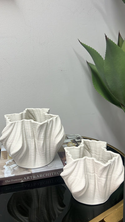 Swivel white ceramic vase