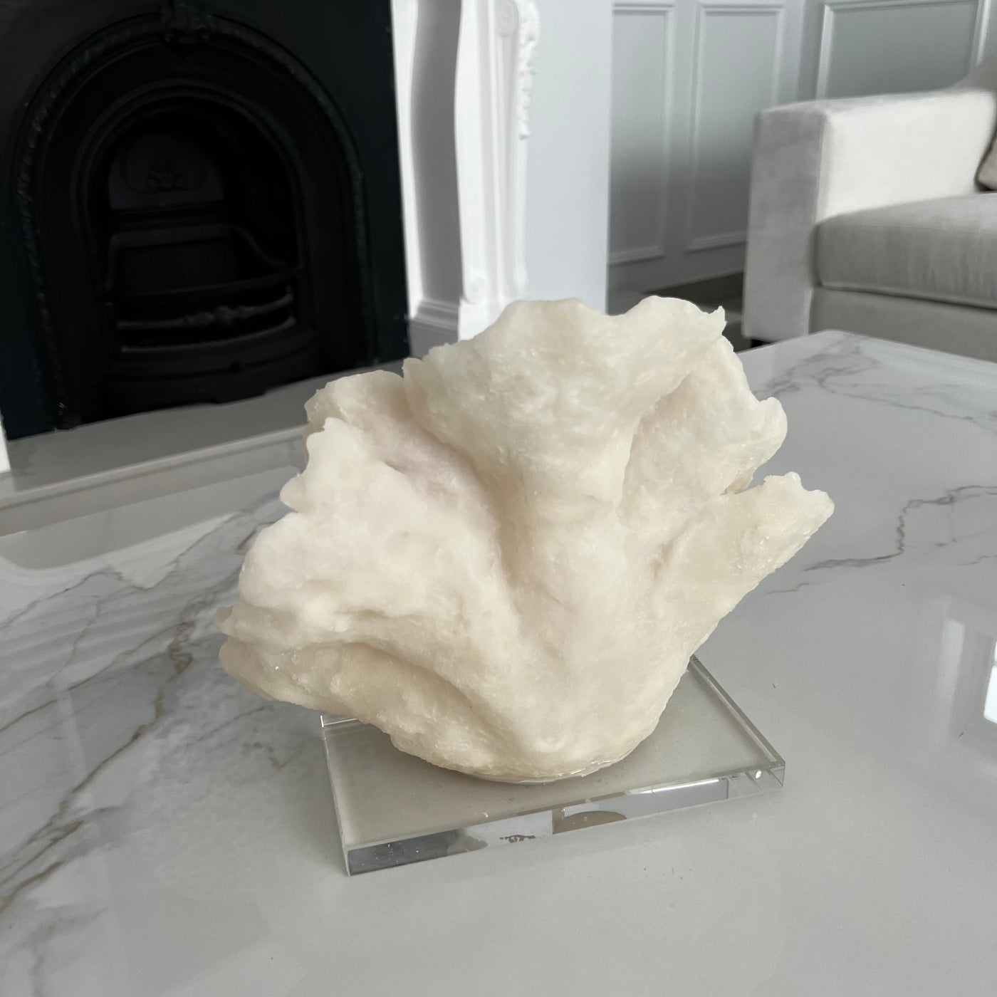 coral quartz sculpture stand